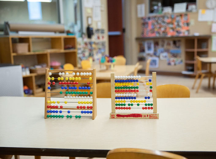 Colorful abacus toys on a table in the CDC building.