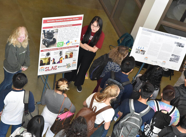 Students pictured from above at a research event put on by the AANAPISI program at Mission College.